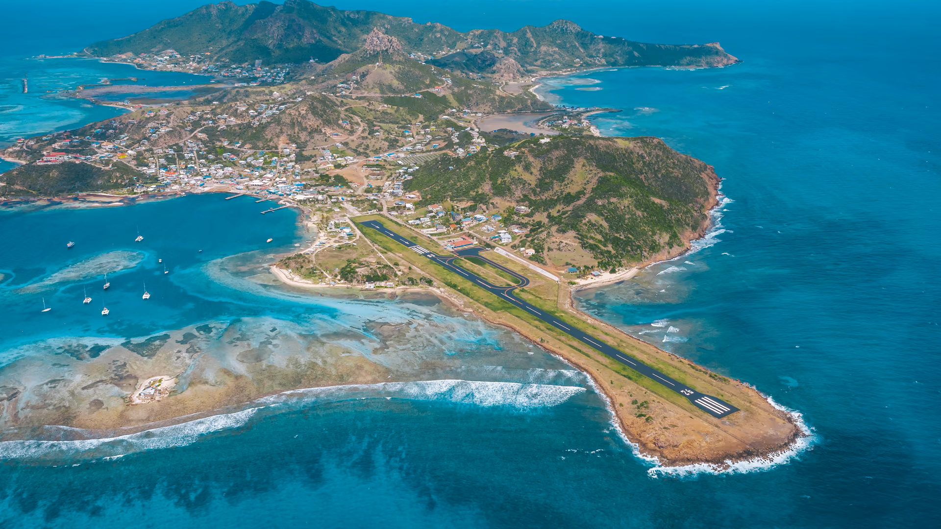 The hills and coastline of Union Island above Clifton